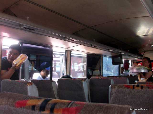 selling food to bus passengers