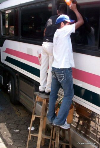sellers on benches, bus stop