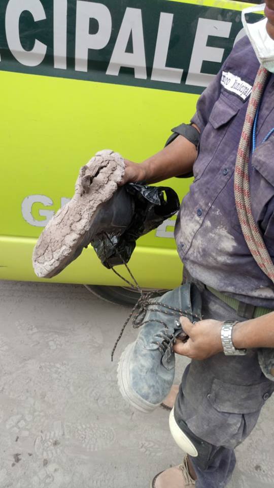rescue personnel with melted footwear from lava